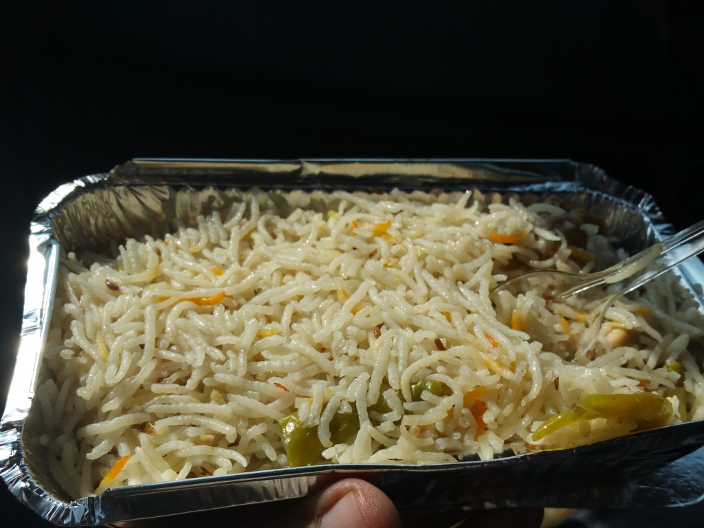 Biryani as I open it...... Chicken pieces lie comfortable under the bed of Fragrant Rice