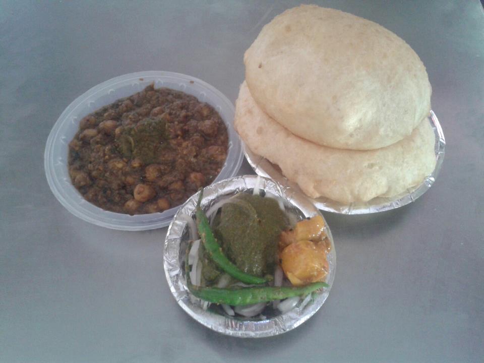 chole bhature with green chillies at CL Corner 